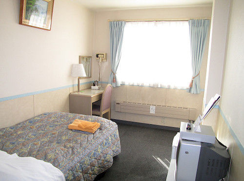 Business Hotel Motonakano Tomakomai Exteriör bild
